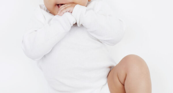 Happily fed baby Smiling baby after successful combination feeding plan