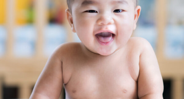 Happy Baby Happy baby after successful breastfeeding support from a lactation physician
